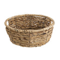 Round woven storage basket in water hyacinth